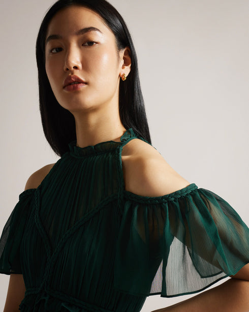 POPPIO-Dresses-Turn heads in POPPIO. Crafted from a lightweight material with a slightly sheer effect, this playful mini dress features a tiered skirt and braided trims that accentuate the look. Pair it with statement jewellery for added drama.The fabric of this product is made with 55% recycled polyester. Using recycled polyester helps divert plastic waste from ending in landfills. Mini dress Rope details High neck Short sleeves Cold shoulder Tiered skirt Concealed fastening Chae is 5'9.5" / 1.77m and wear